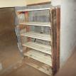 Bookcase constructed with recycled wood siding.